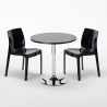 Musta pyöreä pöytä 70x70cm ja kaksi värikästä tuolia Ice Cosmopolitan Mitat