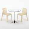 Valkoinen pyöreä pöytä 70x70cm teräsjalalla ja kaksi värikästä tuolia Gruvyer Island 
