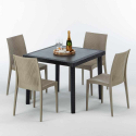 Musta neliönmallinen pöytä 90x90 cm ja 4 värikästä tuolia Bistrot Passion Varasto