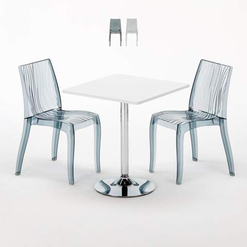Valkoinen neliöpöytä 70x70cm ja kaksi värikästä läpinäkyvää tuolia Dune Titanium