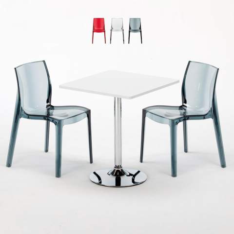 Valkoinen neliöpöytä 70x70cm ja kaksi värikästä läpinäkyvää tuolia Femme Fatale Demon